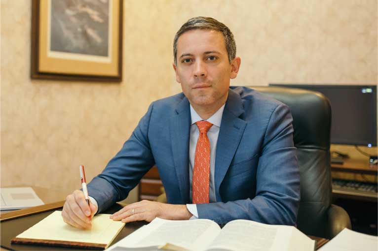 Kelsey Shannon at his desk